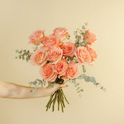 one dozen pink roses